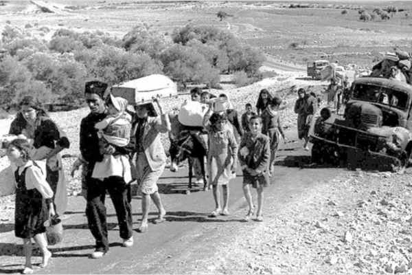 Palestinian refugees flee in 1948.