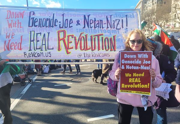 Revcoms with banner and poster at March on Washington for Gaza, January 13, 2024.