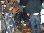 Neighbors help clean out a store in Coney Island after Hurricane Sandy