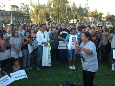 People with family members who are in SHU isolation prison units protest in front of the city hall in Norwalk, California, July 8