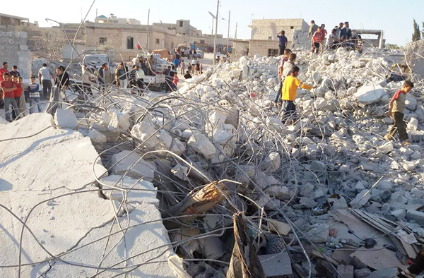 Buildings destroyed by U.S. airstrike in Kfar Derian, Syria, September 2014