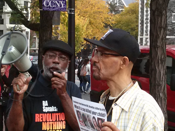 Carl Dix and Nicholas Heyward at CCNY rally, November 3.