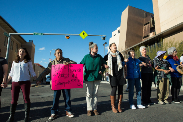 Blocking traffic in protest of ICE raids, Las Cruces, NM, February 15.