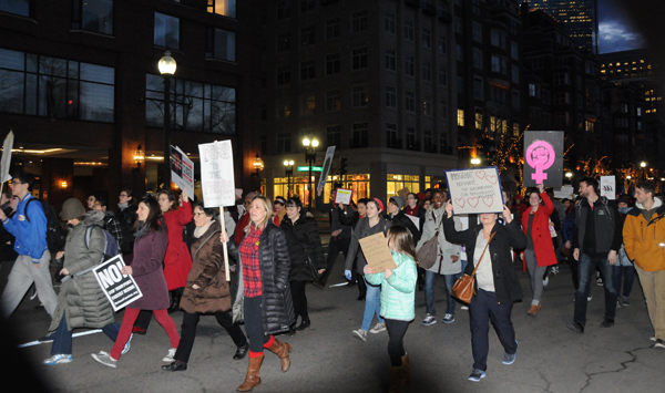 Several hundred demonstrators marched through downtown Boston on International Women's Day demanding an end to the Trump/Pence Regimes war on immigrants, his attacks on abortion rights and on the LGBTQIA community.