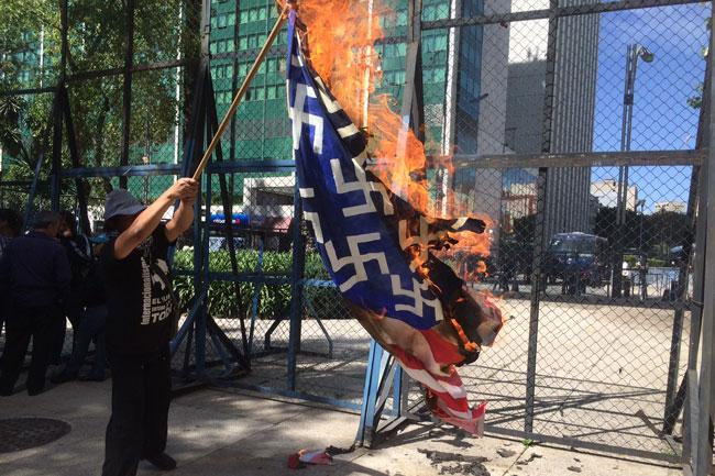 Burning the American flag at the U.S. Embassy, Mexico City, January 20, Trump’s inauguration day.