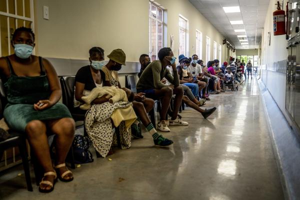 People in South Africa wait to receive vaccine.