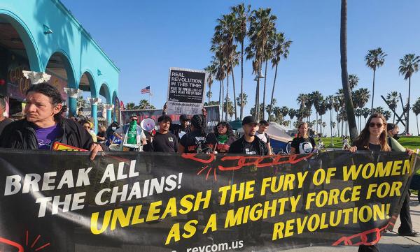 IWD Los Angeles, banner "Break the chains.... for revolution."