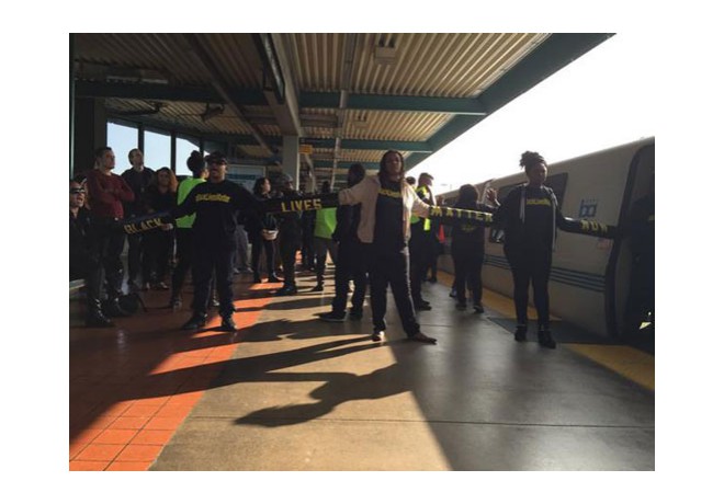 About 25 people chained themselves  to BART (Bay Area Rapid Transit) train and delaying public transport for 2 hours. Nov 28, 2014. 