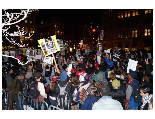 NYC 11-25-2014: Marching out of Union Square with fists in the air