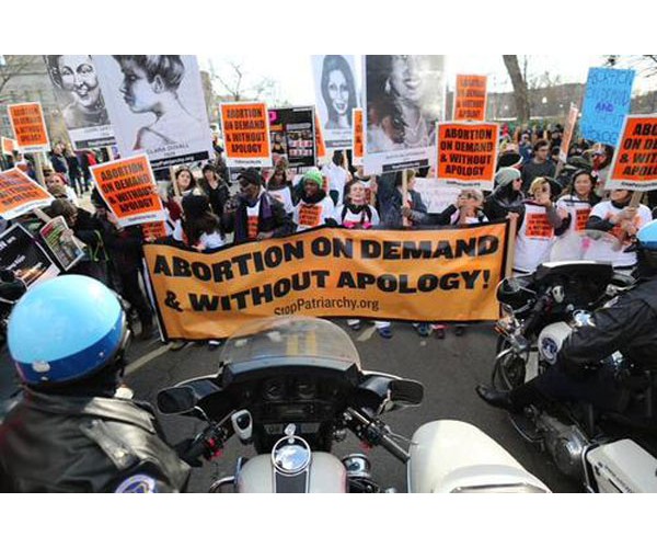 Washington, DC, January 22, 2015: Brave protesters demanding 'Abortion on demand and without apology!' STOPPED the so-called 'March for Life' (march for forced motherhood) – 8 were arrested.