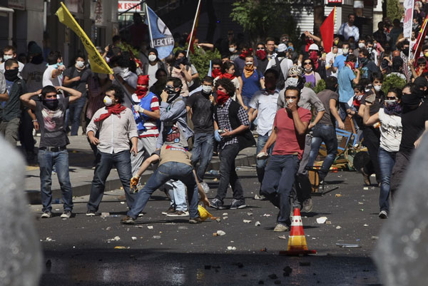 Thousands of Turkish youths gather at Ankara's main Kizilay Square in the face of government attacks on them, Saturday, June 1, 2013. National protests over a  violent police raid of an anti-development sit-in in Taksim square  revealed the depths of anger against Prime Minister Recep Tayyip Erdogan.