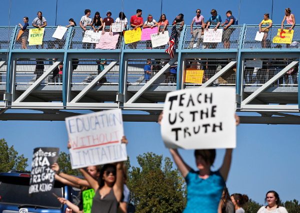 Students protest at a busy intersection in Denver suburb of Littleton, September 25. 