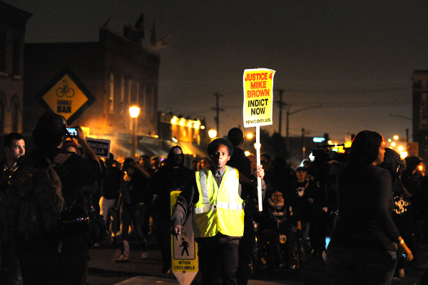 Marching through Shaw district, South St. Louis, Sunday night, Oct. 12
