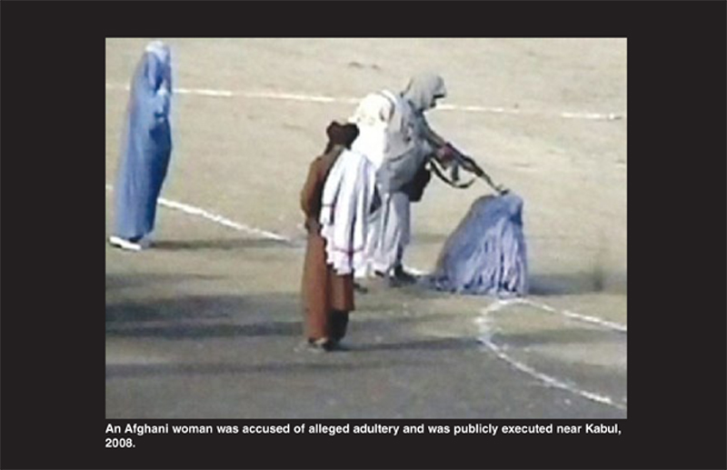 An Afghani woman was accused of alleged adultery and was publicly executed near Kabul, 2008