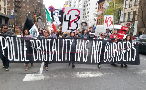 In New York City, family members of the 43 disappeared were joined by three people whose children had been murdered by the NYPD.  This deeply felt connection was expressed on a banner that led the march: Police Murder Has No Borders. 