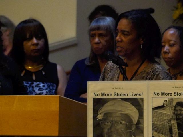 Shirley Walker, sister of David Walker, with other Seattle family members in background