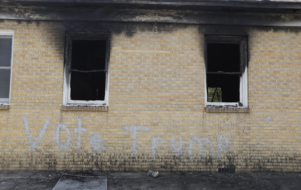 Hopewell Baptist Church in Greenville, Mississippi gutted by arson, with the words "Vote trump" spray-painted on one wall.