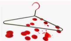 Bloody Wire Coat Hanger Reminder Of Unsafe Abortion Stock Photo