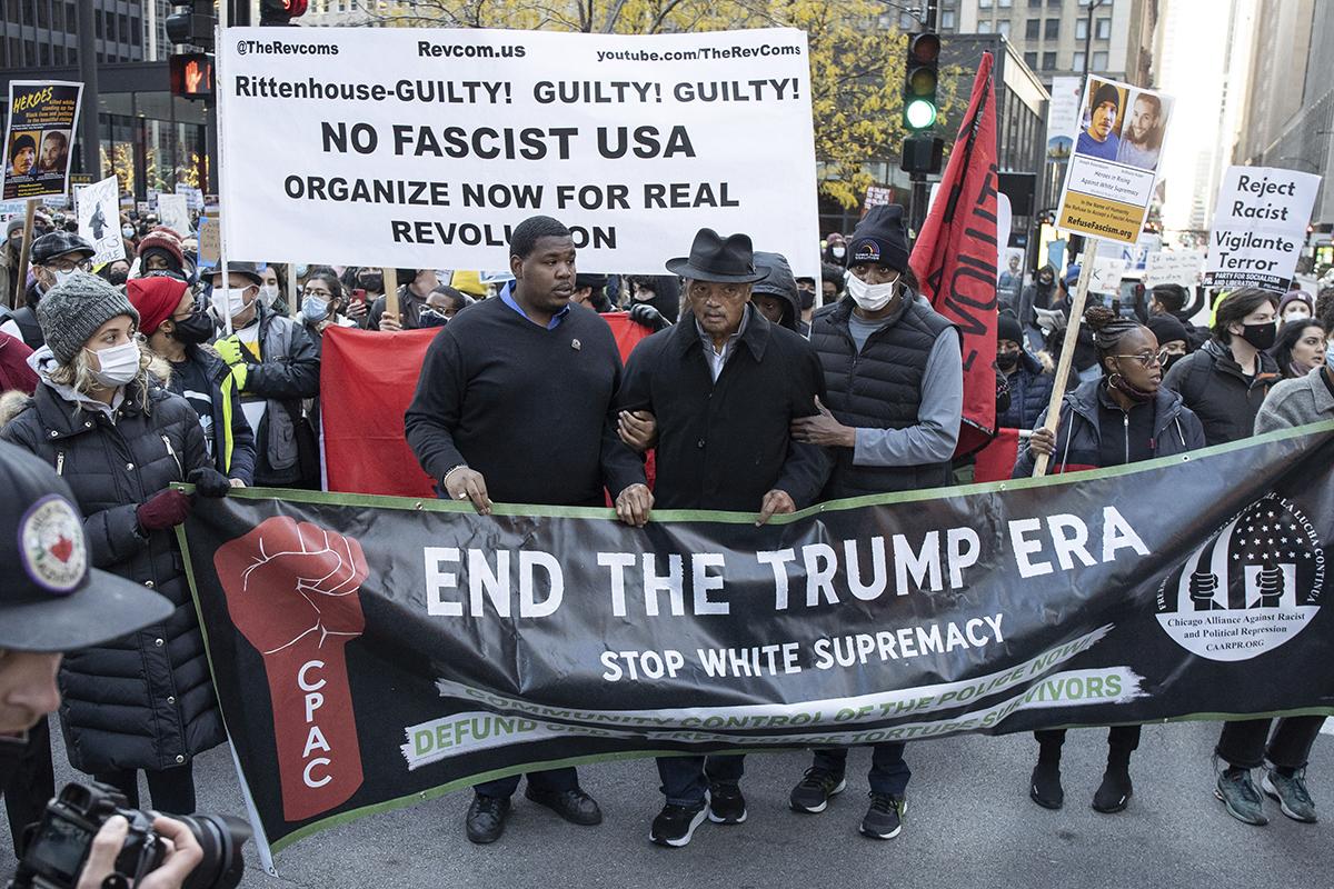 Hundreds protest in Chicago with GUILTY GUILTY GUILTY banner after Rittenhouse was acquitted.