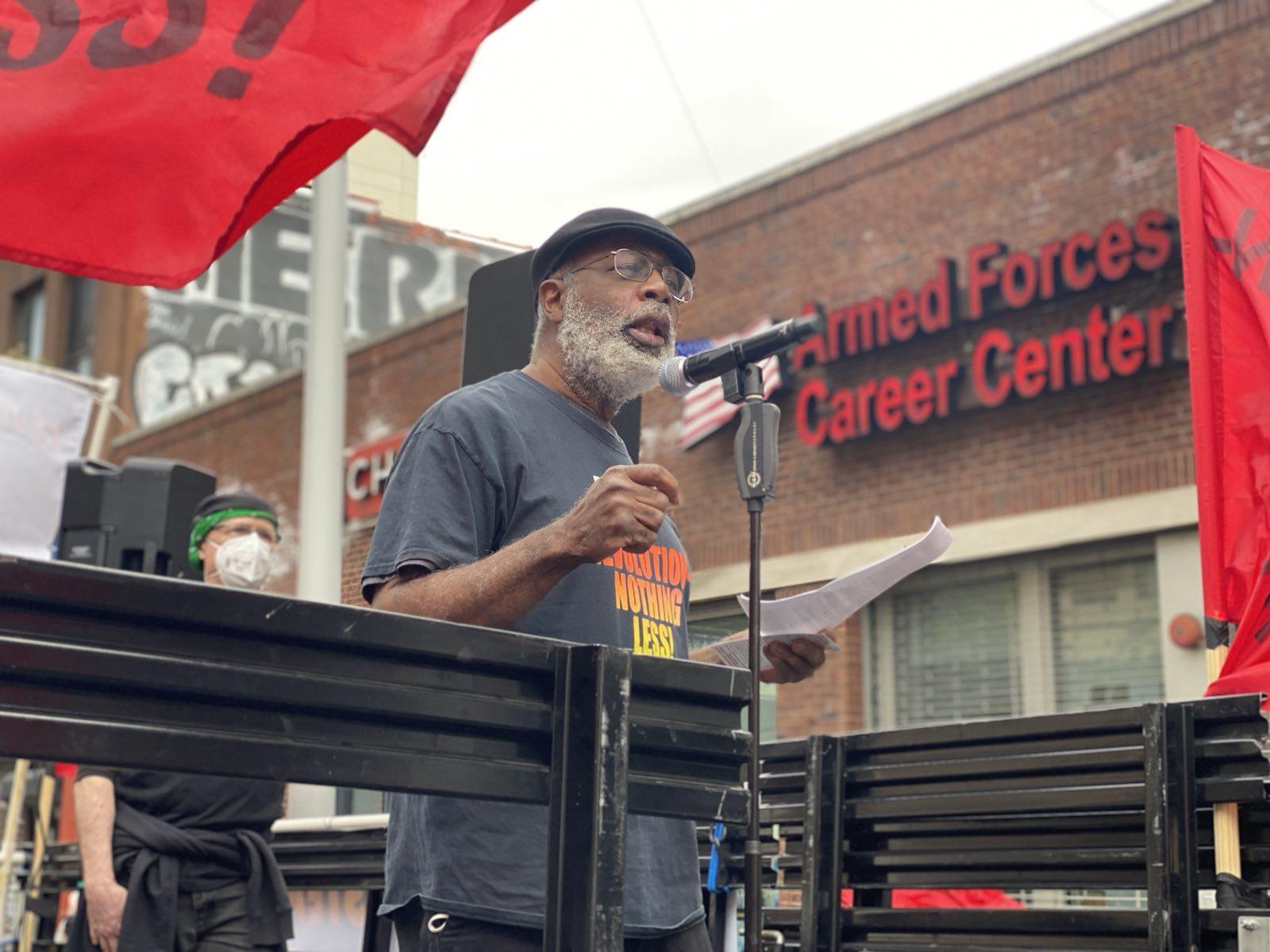 Carl Dix speaking at Recruitment Center in New York City on May Day.