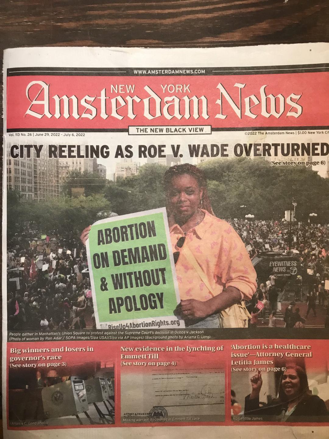 front page of NYC Amsterdam News with RU4AR sign