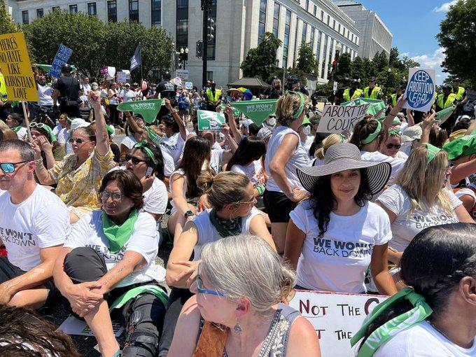 Abortion rights sit in in Washington, D.C., June 30