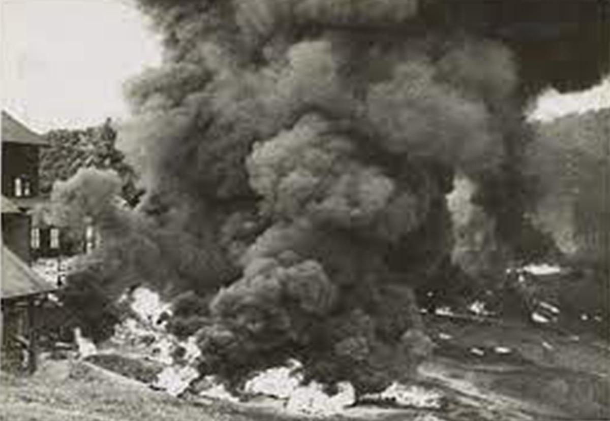 In Malaya, smoke from British scorched-earth policy, 1942.