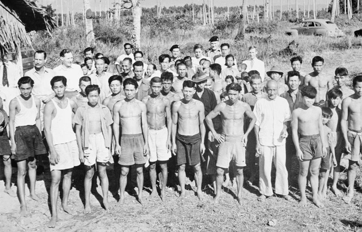 Ethnic Chinese-Malay squatters, forcibly relocated by the British as part of the Briggs' Plan, a counterinsurgency strategy used by Britain.