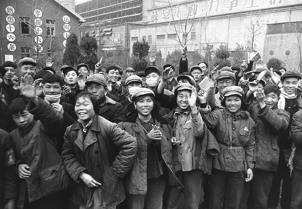 In revolutionary China, Red Guards take the Red Book of Mao's quotations to a factory. 