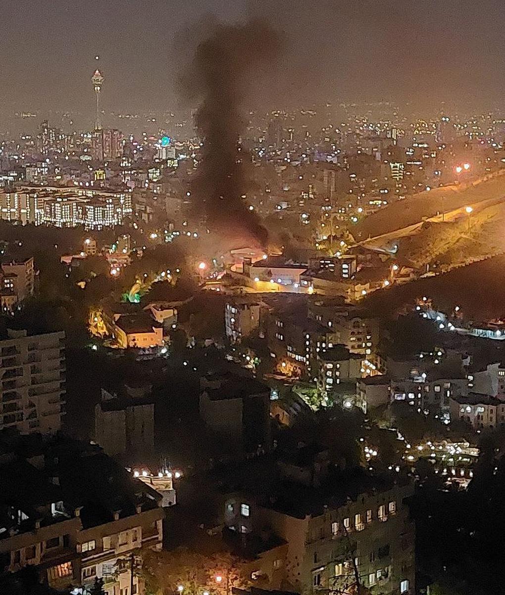 Night view of Evin prison in Tehran up in flames, October 15, 2022.