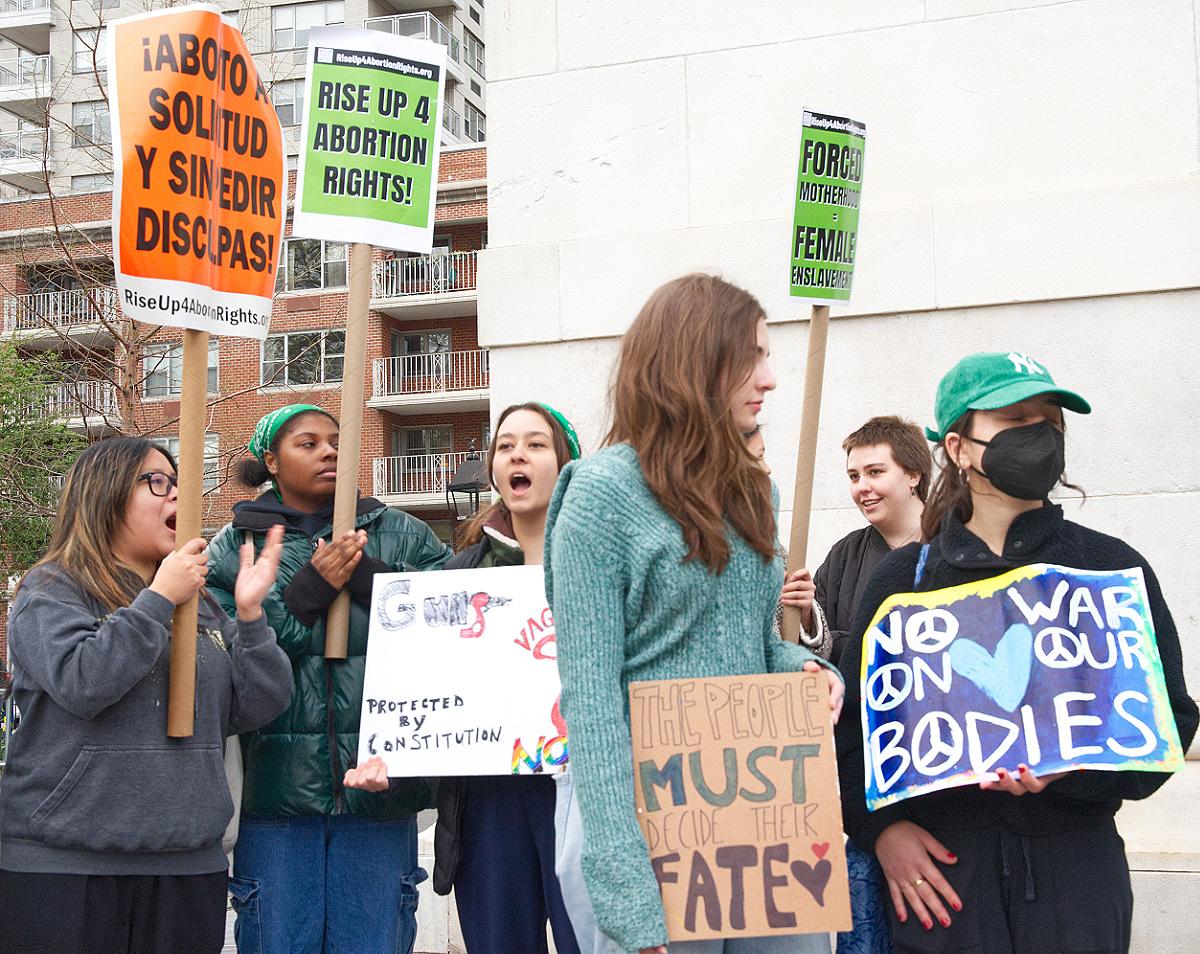 NYC, protest Texas ruling on Mifepristone, youth with signs