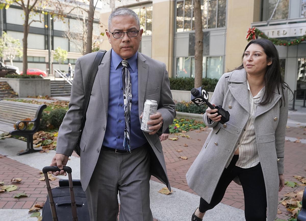 Ray Garcia, former warden of California women's prison accused of sexual assault, leaves Federal Courthouse.