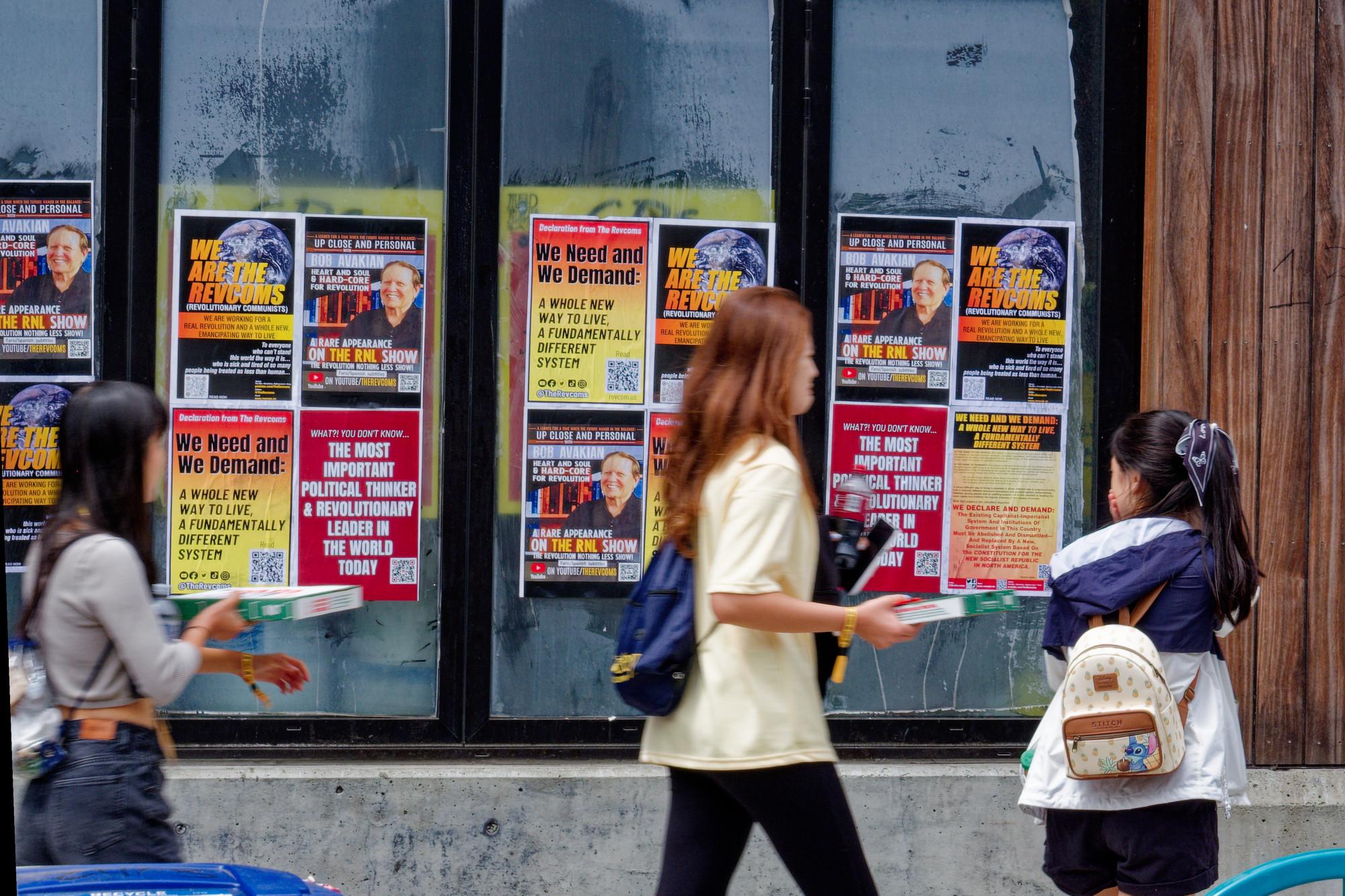 Posters saturate Telegraph Avenue, Berkeley, CA.