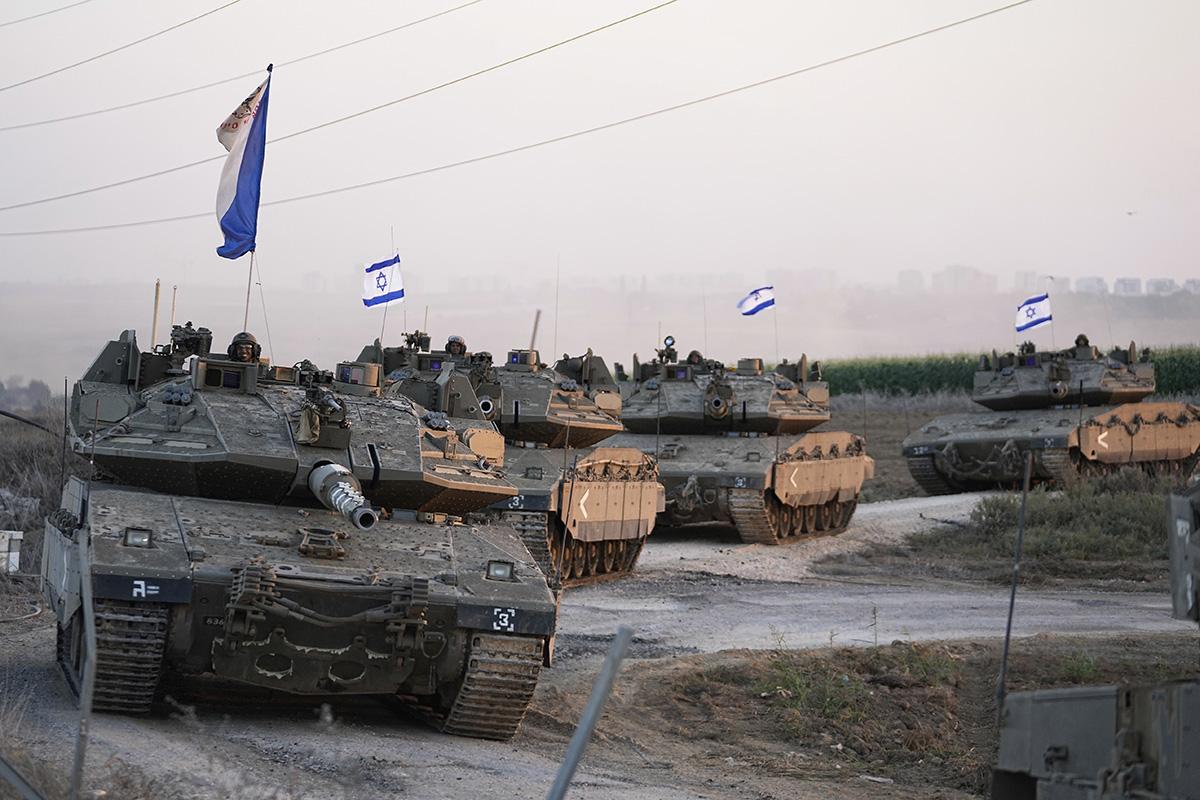 Israeli tanks head toward Gaza Strip, October 12, 2023.