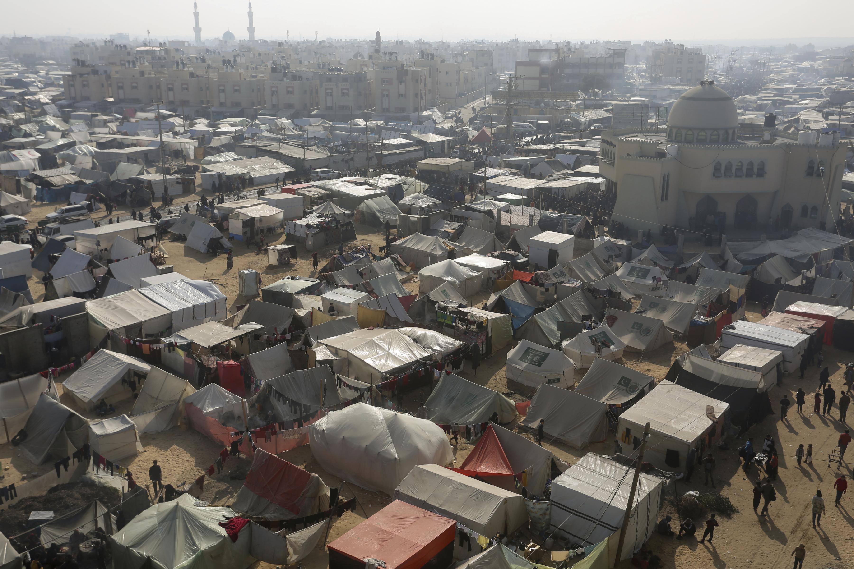 A view of the makeshift tent camp where Palestinians displaced by the Israeli bombardment of the Gaza Strip are staying, in the Muwasi area on Monday, Jan. 1, 2024. Israel has encouraged Palestinians to move to Muwasi, declaring the thin coastal strip a safe zone.