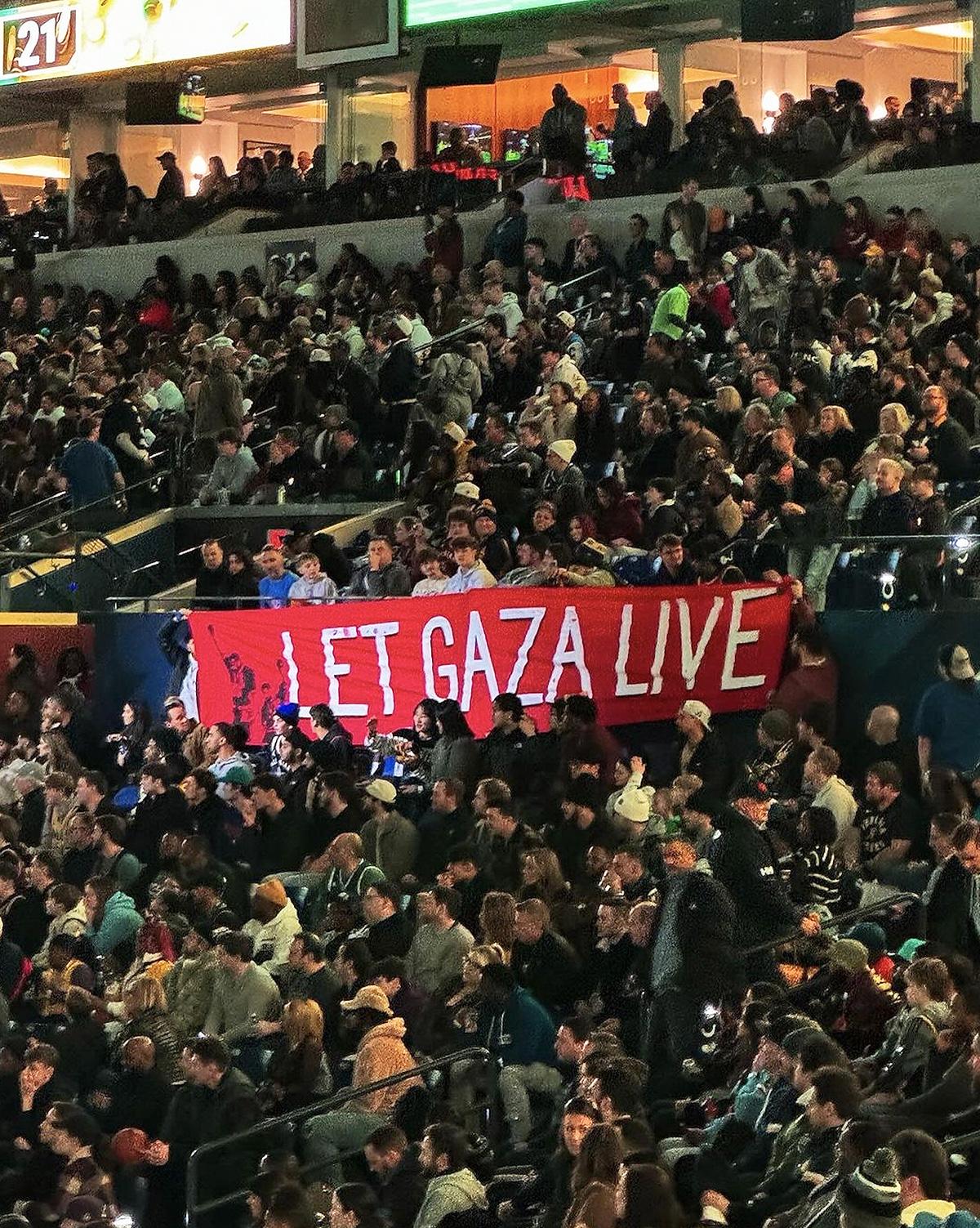 Athletes for Ceasefire raised a banner during the NBA All-Star weekend in Indianapolis.