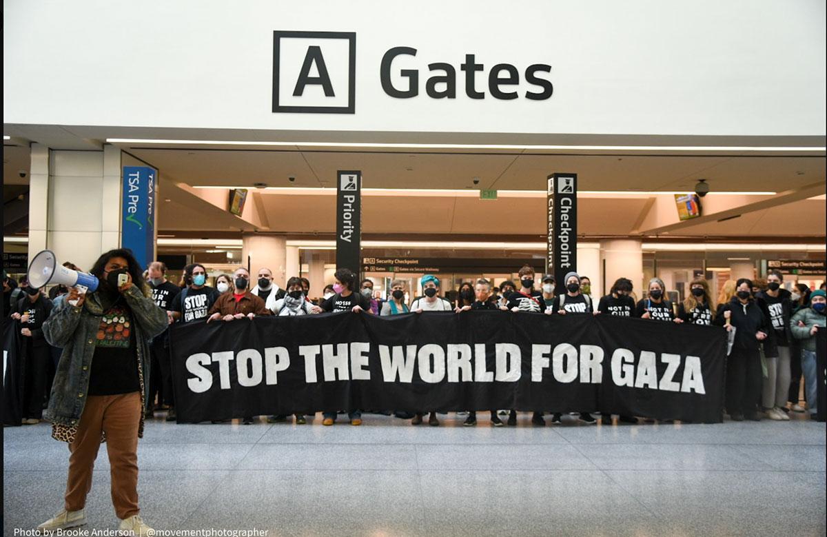 Hundreds of protestors shut down SFO International Terminal, demanding permanent #CEASEFIRE in war on #Gaza and an end to US arms to Israel.