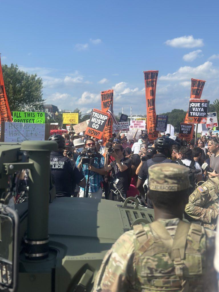 Refuse Fascism marchers face police and national guard, August 16, 2025.
