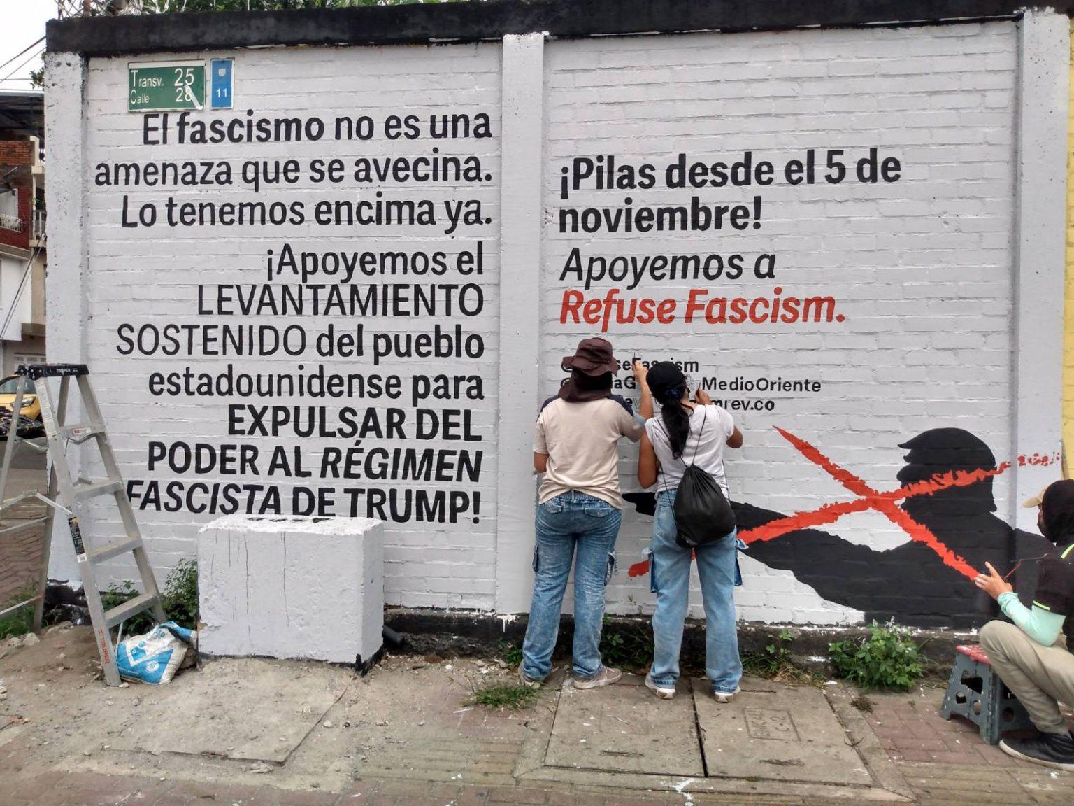 Mural being painted by people in Colombia supporting Refuse Fascism.