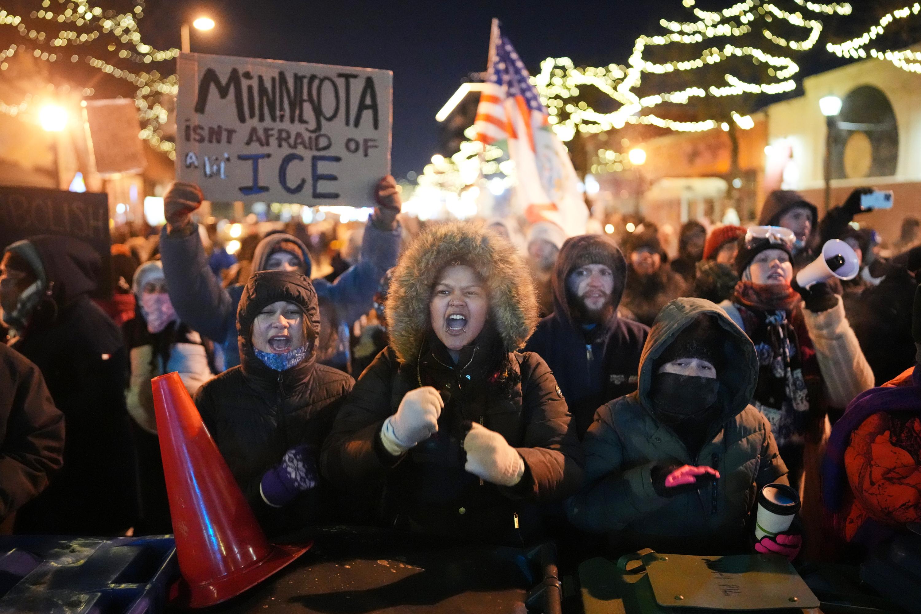Protesters in Minneapolis with sign "we are not afraid of ICE"