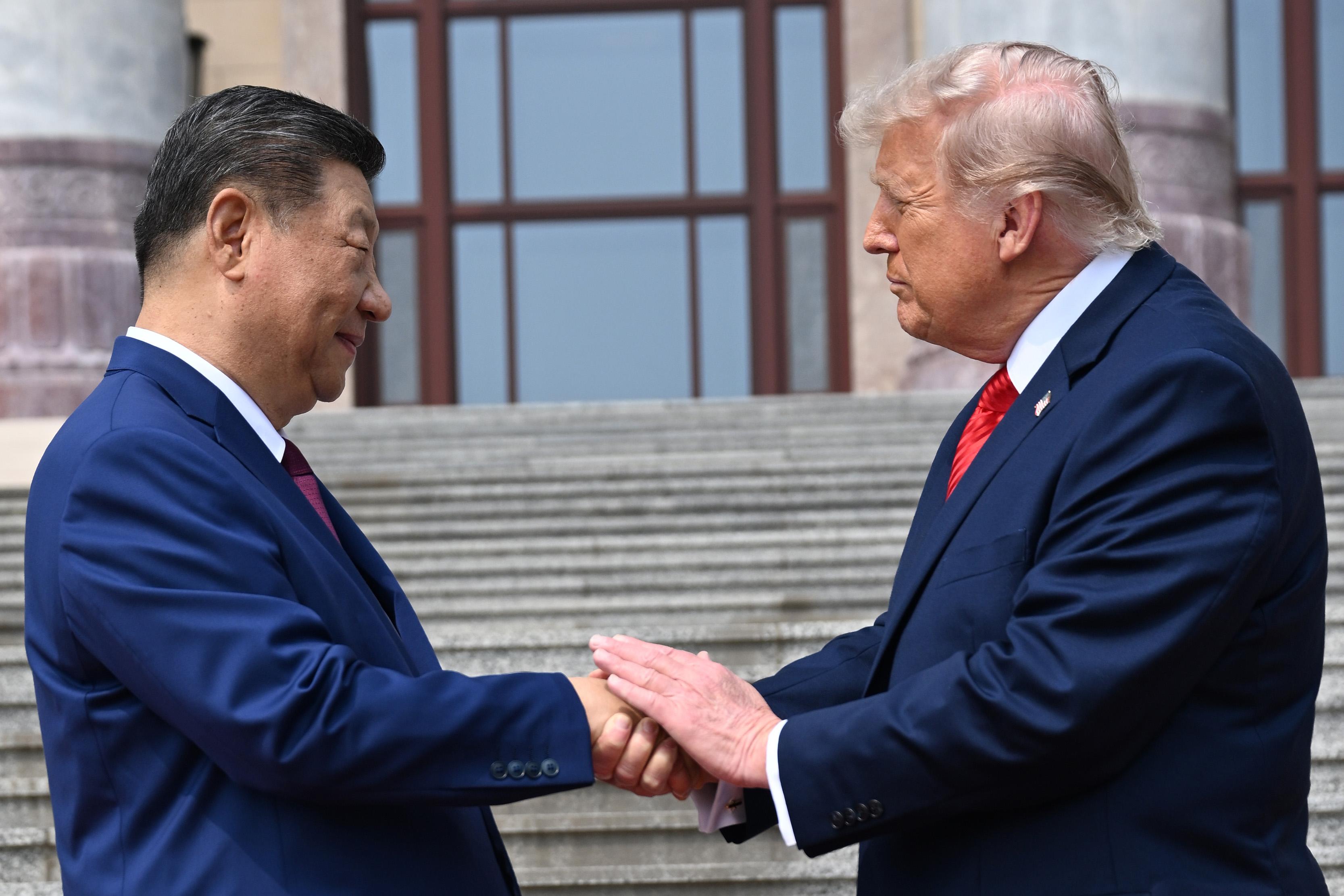 Chinese President Xi Jinping shakes hands with U.S. President Donald Trump in Beijing, May 14, 2026.