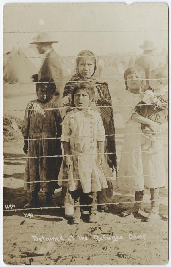 Electrically charged fence detains Mexican refugee children, Fort Bliss, Texas, 1914.