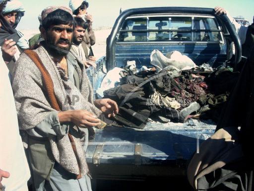 Afghanis mourn children killed in U.S. airstrike.