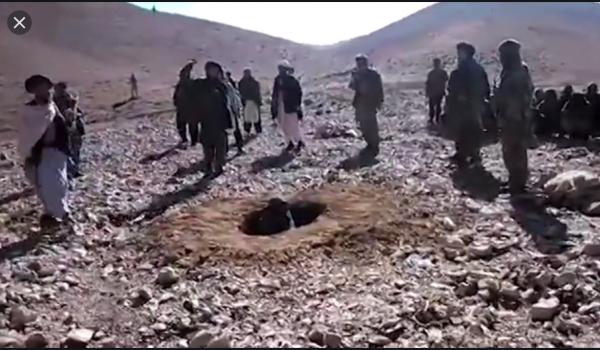 Afghani people witness stoning of a woman