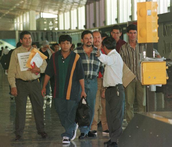El Salvadorans being deported, February 1999.