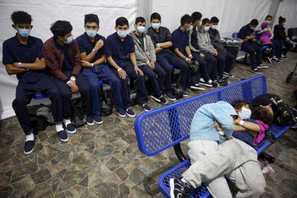Young immigrants being held in holding facility, Donna, Texas.