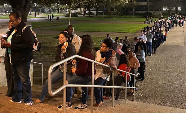 Early voters wait in line at Southern Texas University
