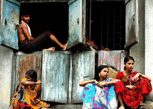 India women sex workers waiting in front of brothel