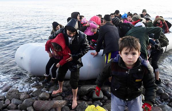 Migrants from Turkey arrive by boat at Lesbos, Greece.