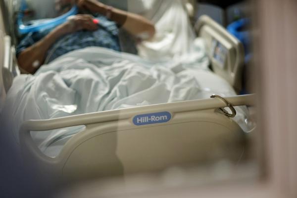 Rhode Island prisoner with Covid 19 on ventilator is shackled to hospital bed. 